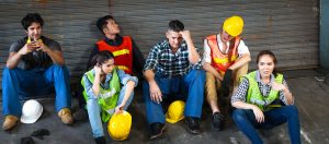 Depressed group of industrial worker tired of work or losing job
